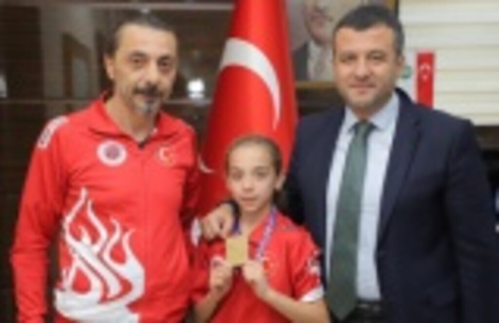 Dünya şampiyonu Başkan Doğan'ı ziyaret etti