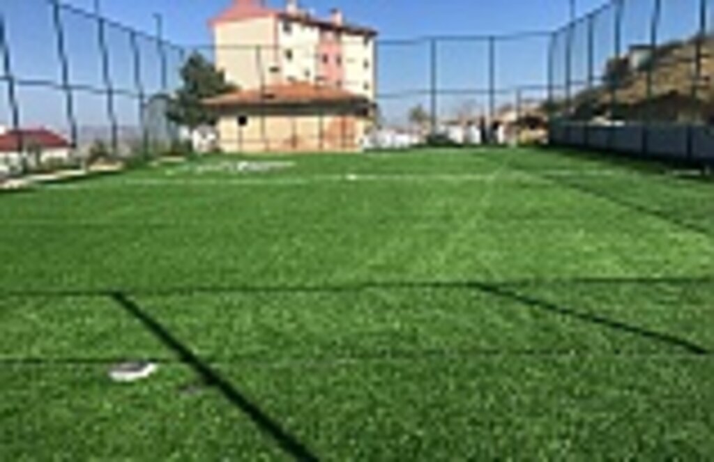 Çakıralan Muhtarı Çavdar’dan sentetik çim saha teşekkürü
