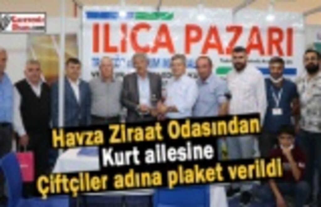 Havza Ziraat Odasından Kurt ailesine çiftçiler adına plaket verildi