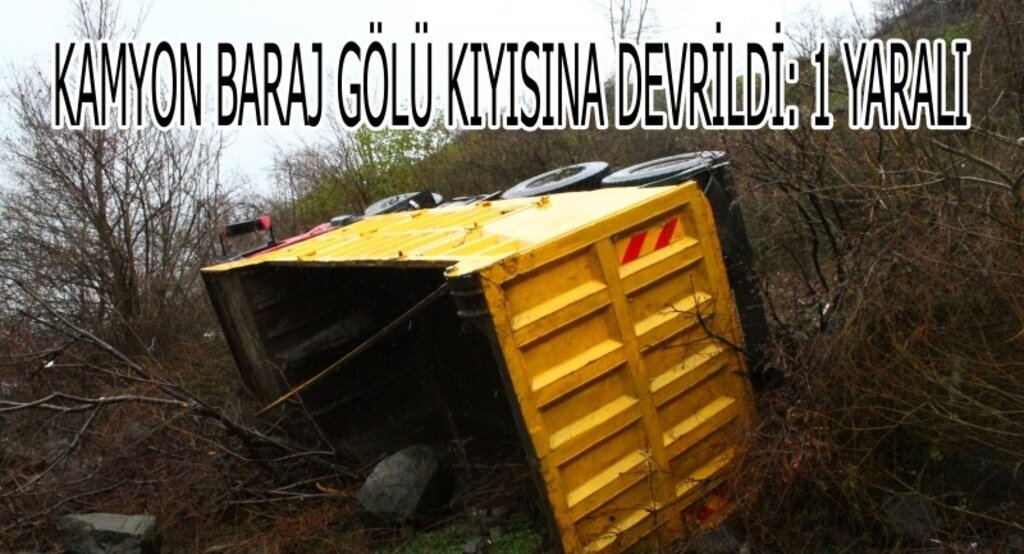 Ayvacık'ta kamyon baraj gölü kıyısına devrildi: 1 yaralı