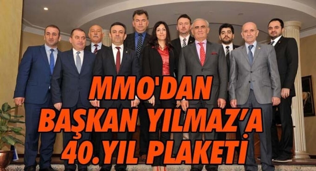 BAŞKAN YILMAZ’A 40.YIL PLAKETİ