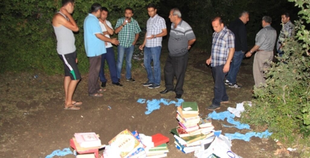 Toprağa gömülmüş Kur'an-ı Kerim ve yakılmış incil bulundu